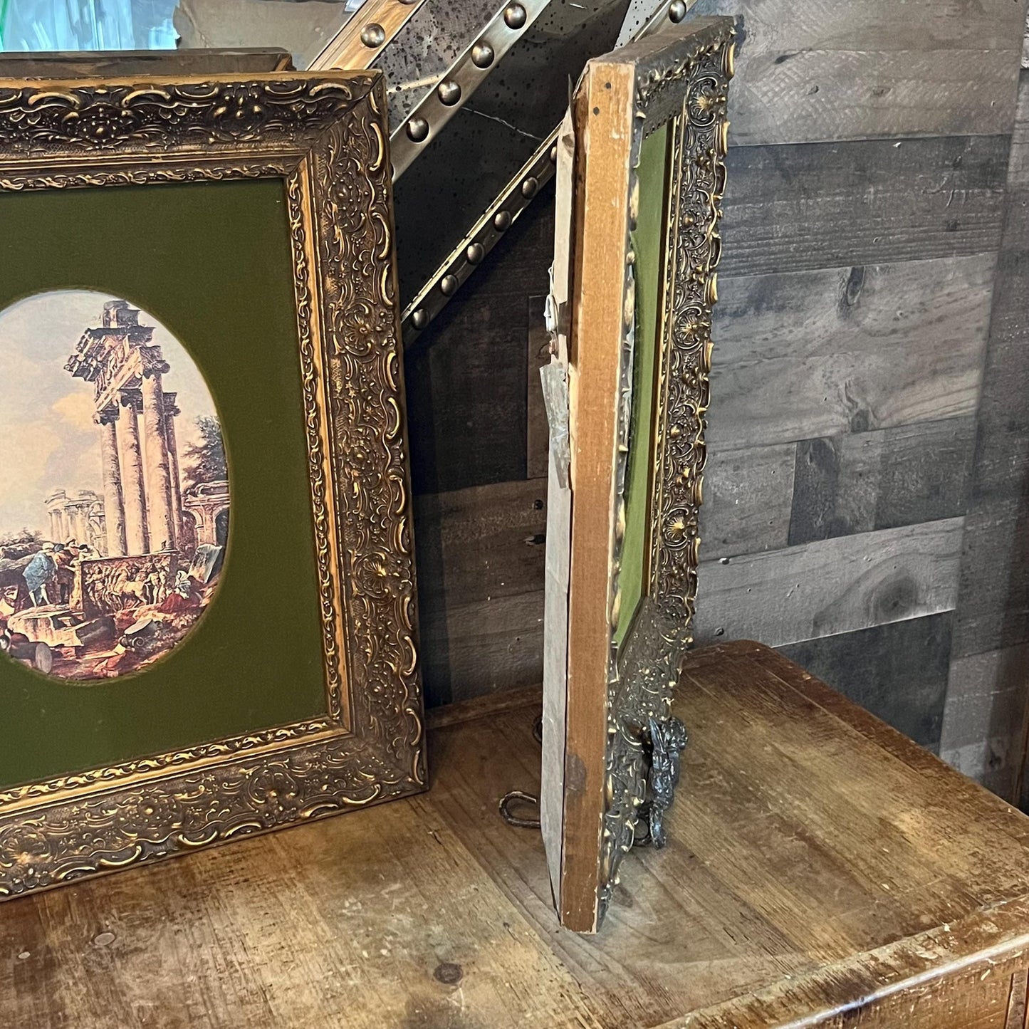 Pair of Oval Roman Ruins Scenes with Green Fabric and Vintage Wooden Frames