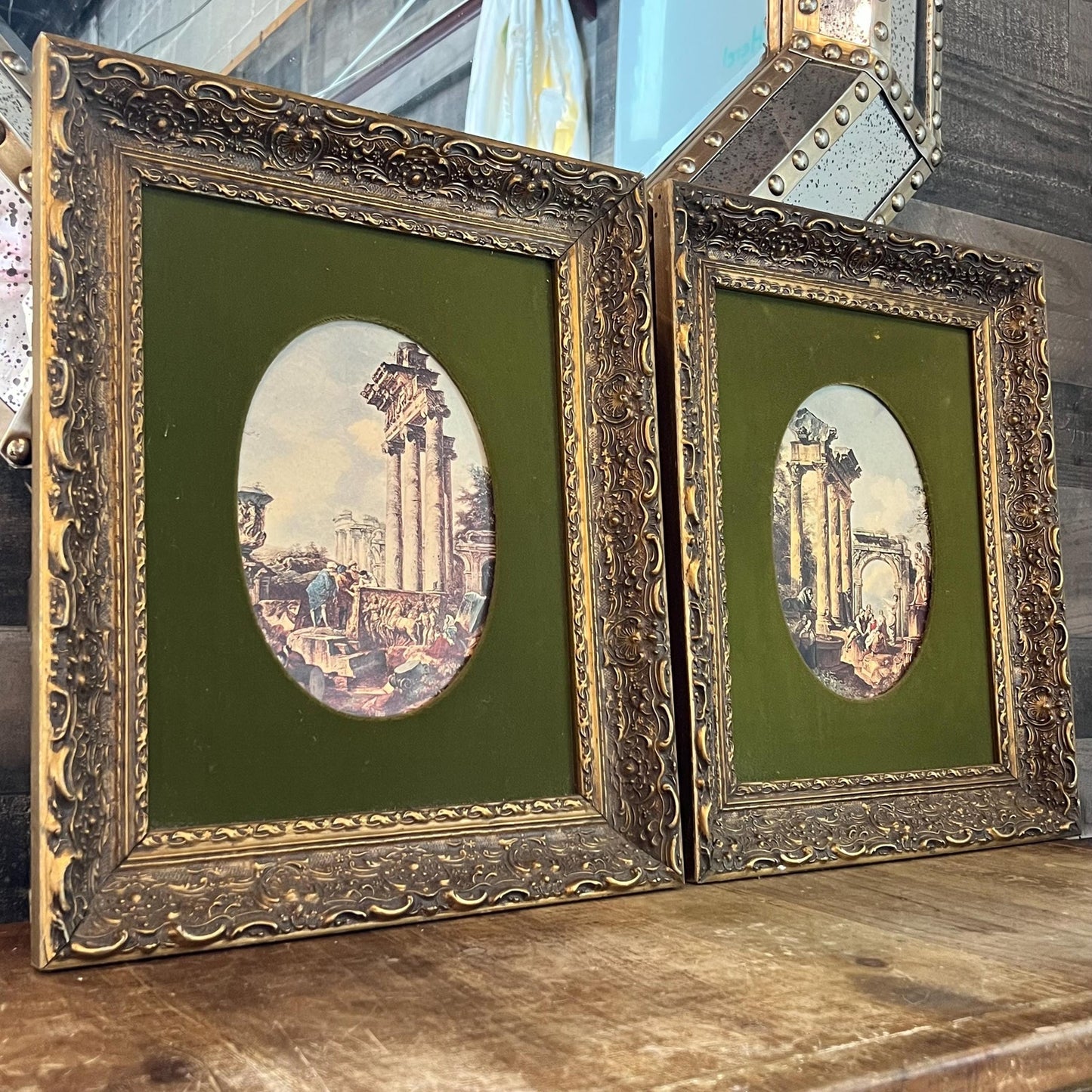Pair of Oval Roman Ruins Scenes with Green Fabric and Vintage Wooden Frames