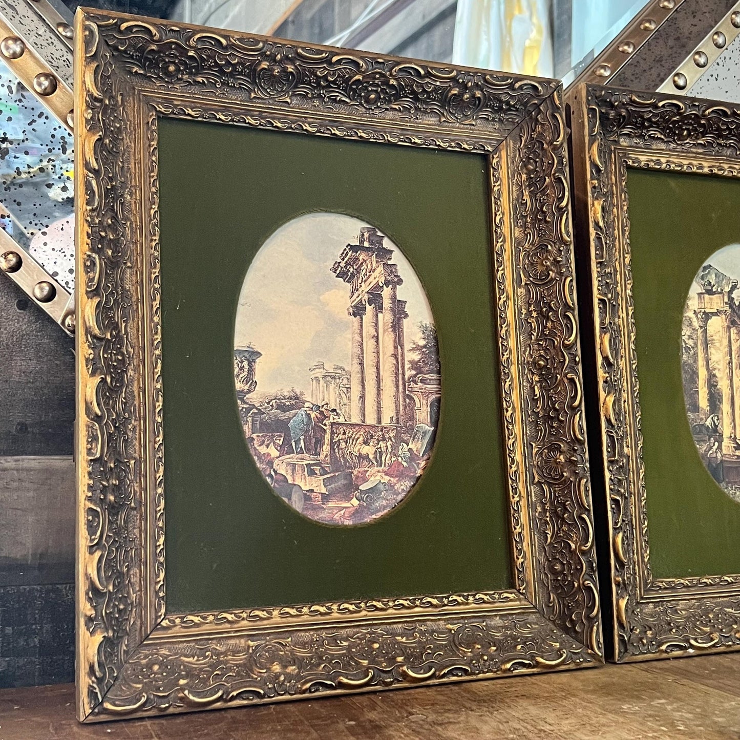 Pair of Oval Roman Ruins Scenes with Green Fabric and Vintage Wooden Frames