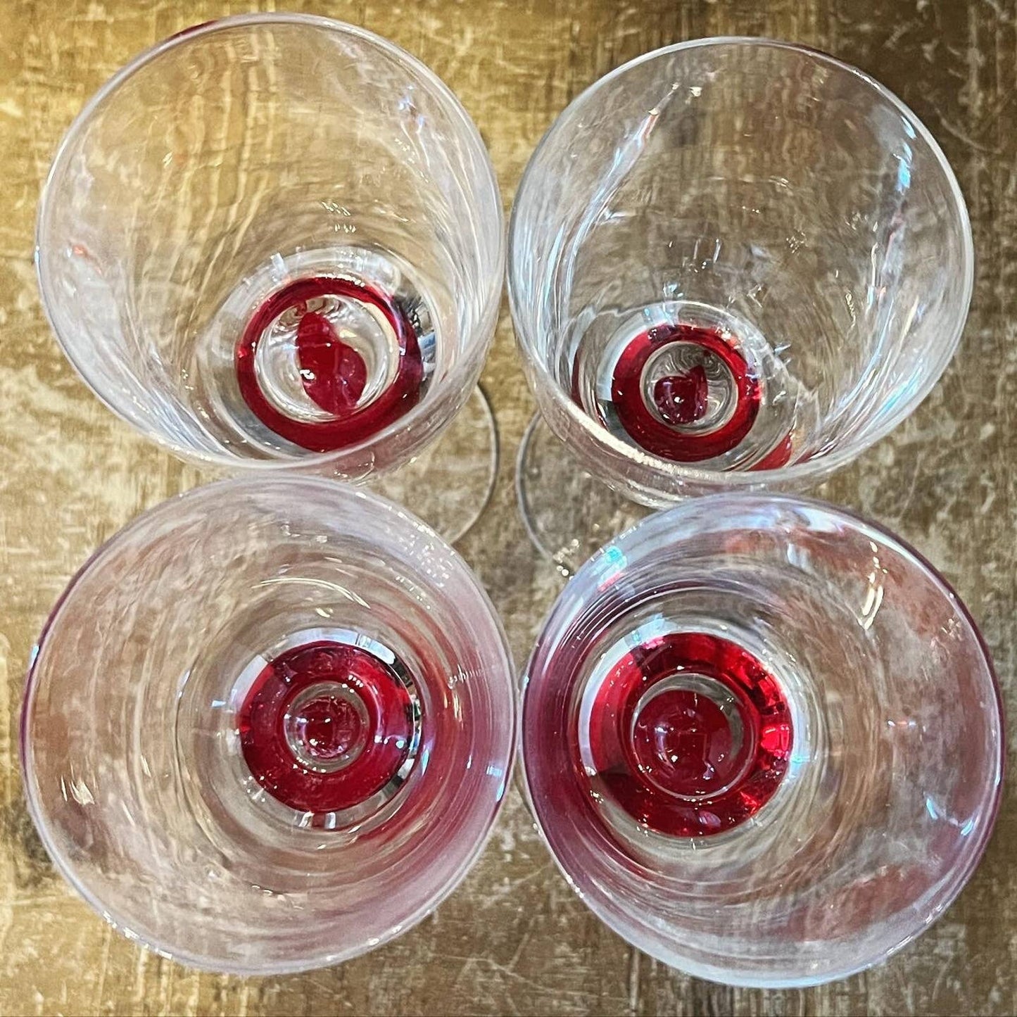 Set of 4 red teardrop long stem clear glass wine glasses