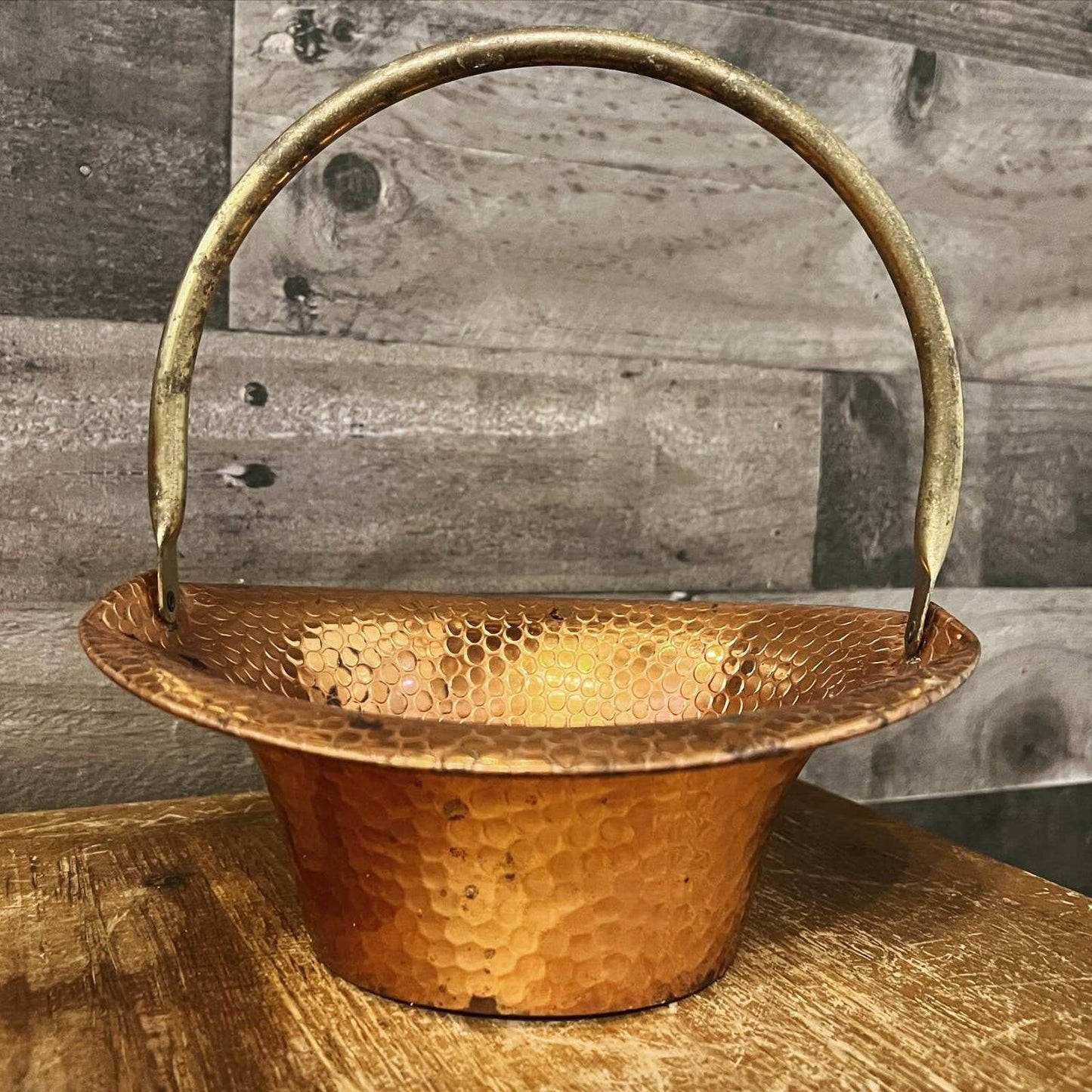 Vintage Coppercraft Guild hammered copper basket with brass handle