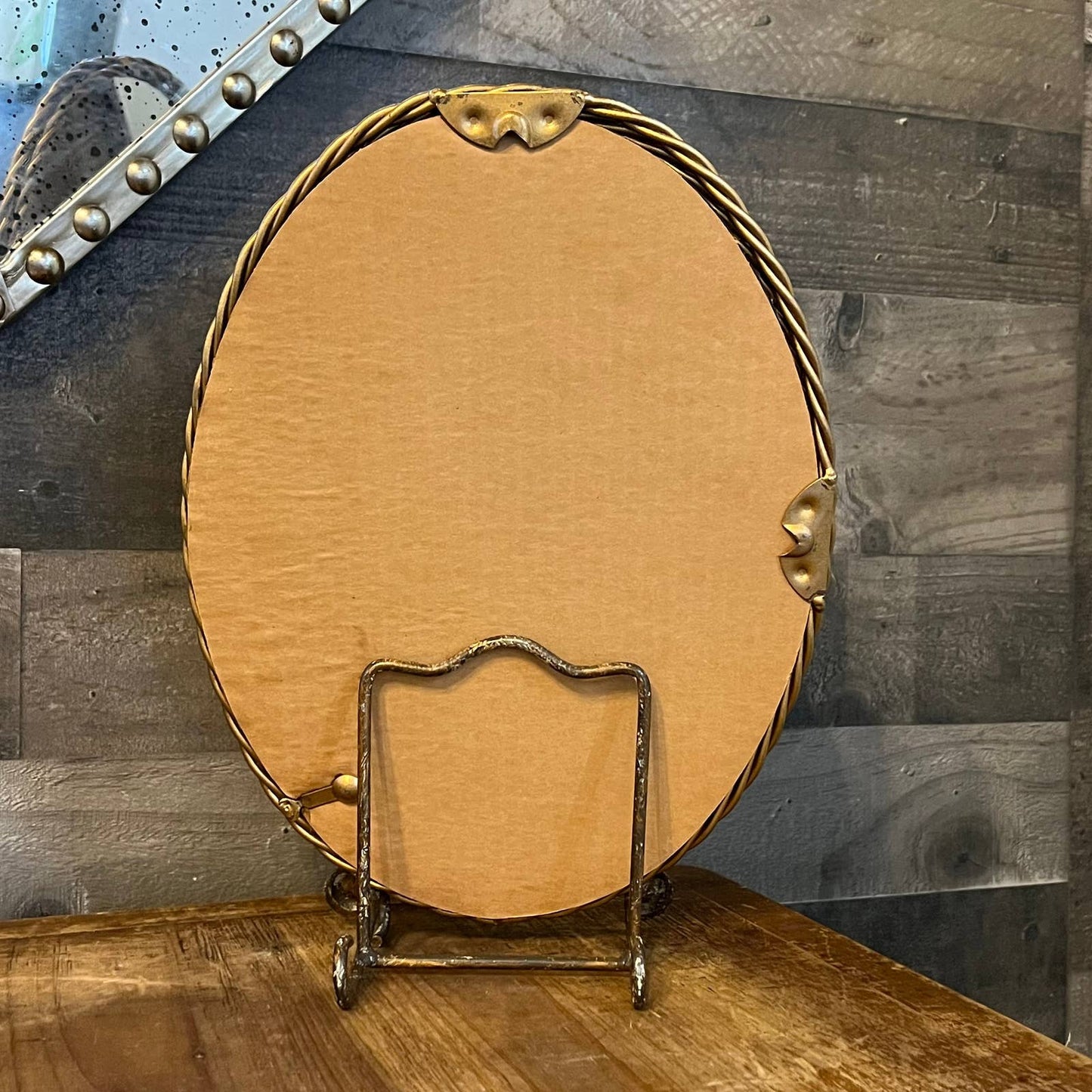 Vintage gold braided frame oval mirror
