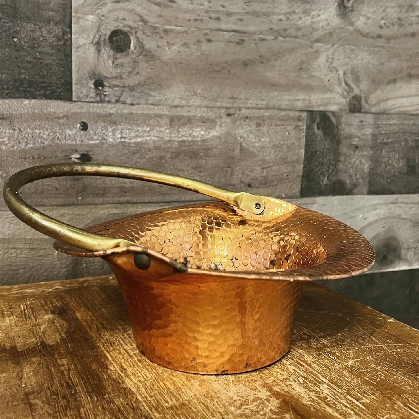 Vintage Coppercraft Guild hammered copper basket with brass handle