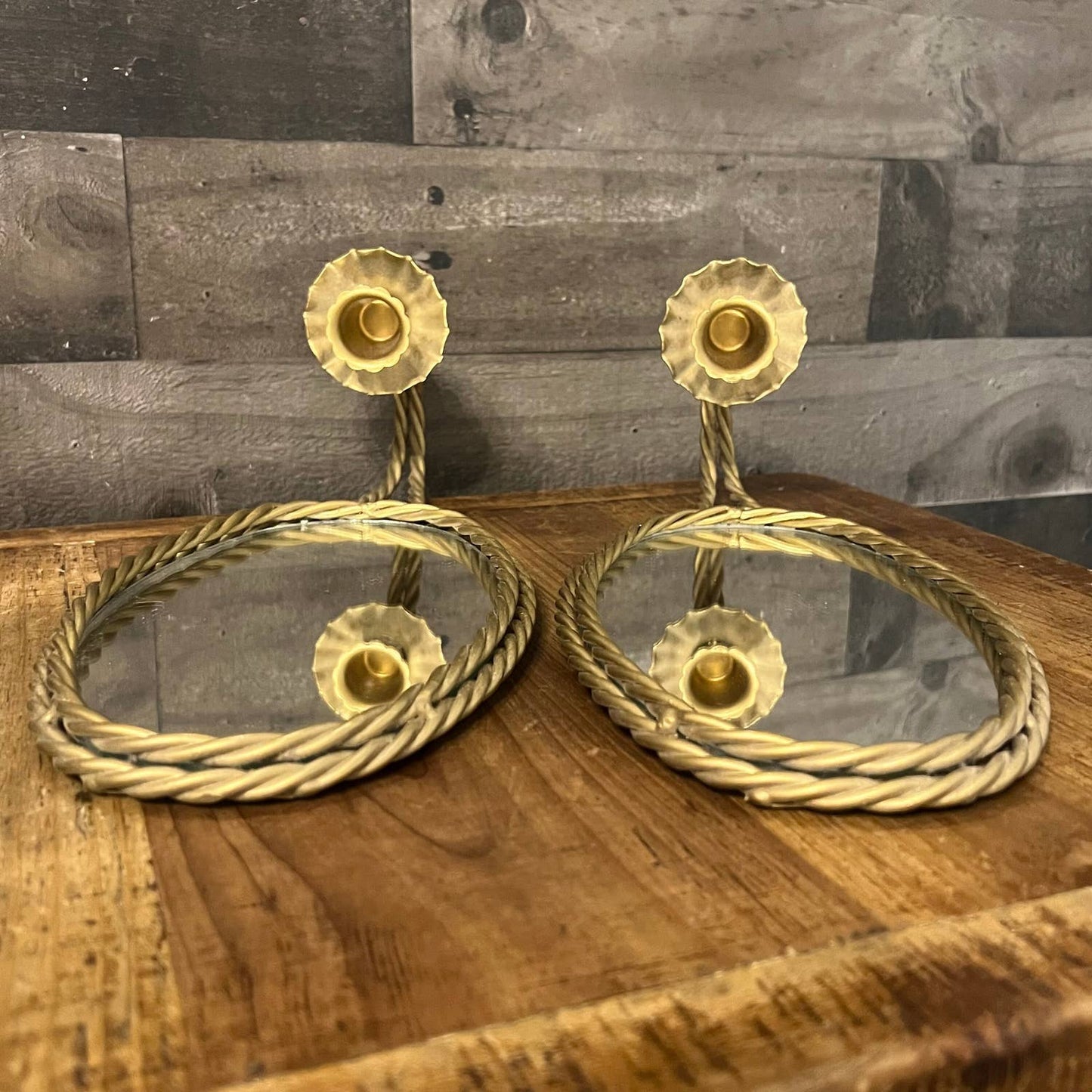 Vintage pair of gold braid mirrored candlestick wall sconces