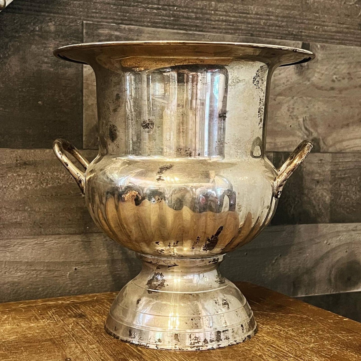 Vintage silver toned handled champagne / wine bottle chiller on a pedestal