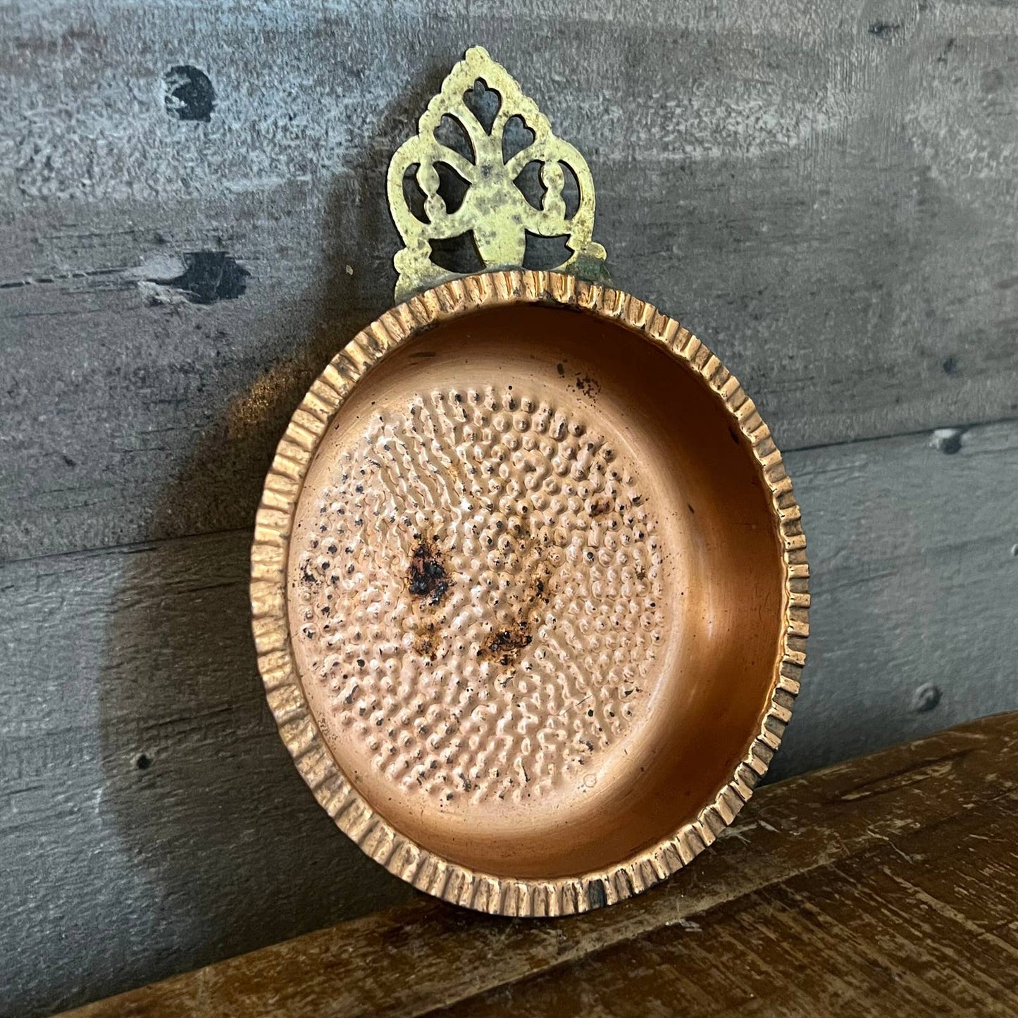 Vintage hammered copper trinket tray with brass handle