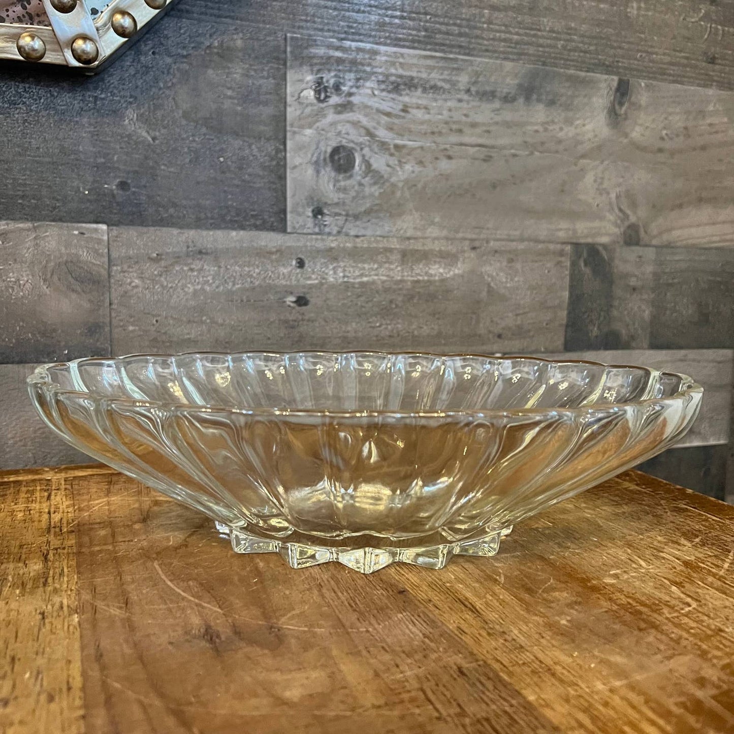 Clear glass scalloped oval bowl