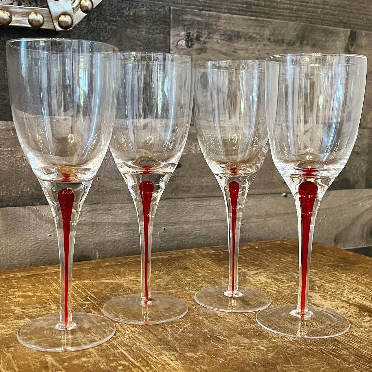 Set of 4 red teardrop long stem clear glass wine glasses
