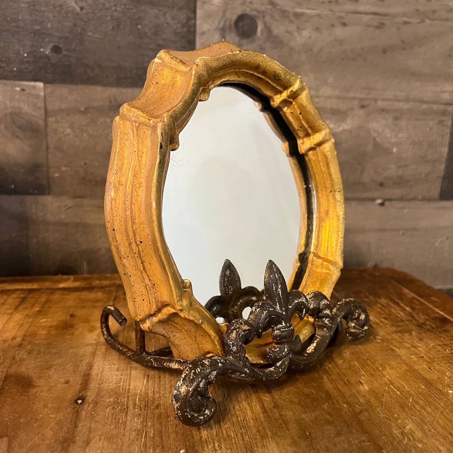 Vintage small gold frame mirror
