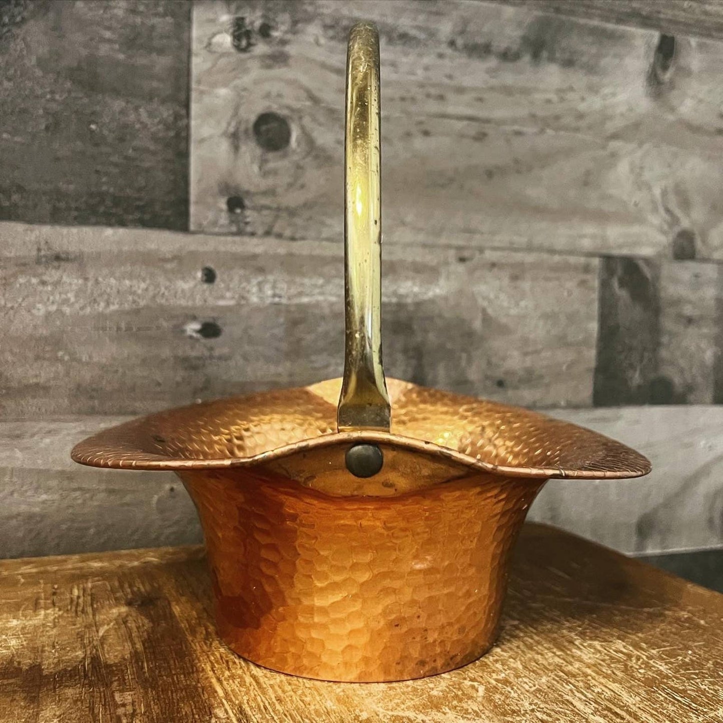 Vintage Coppercraft Guild hammered copper basket with brass handle