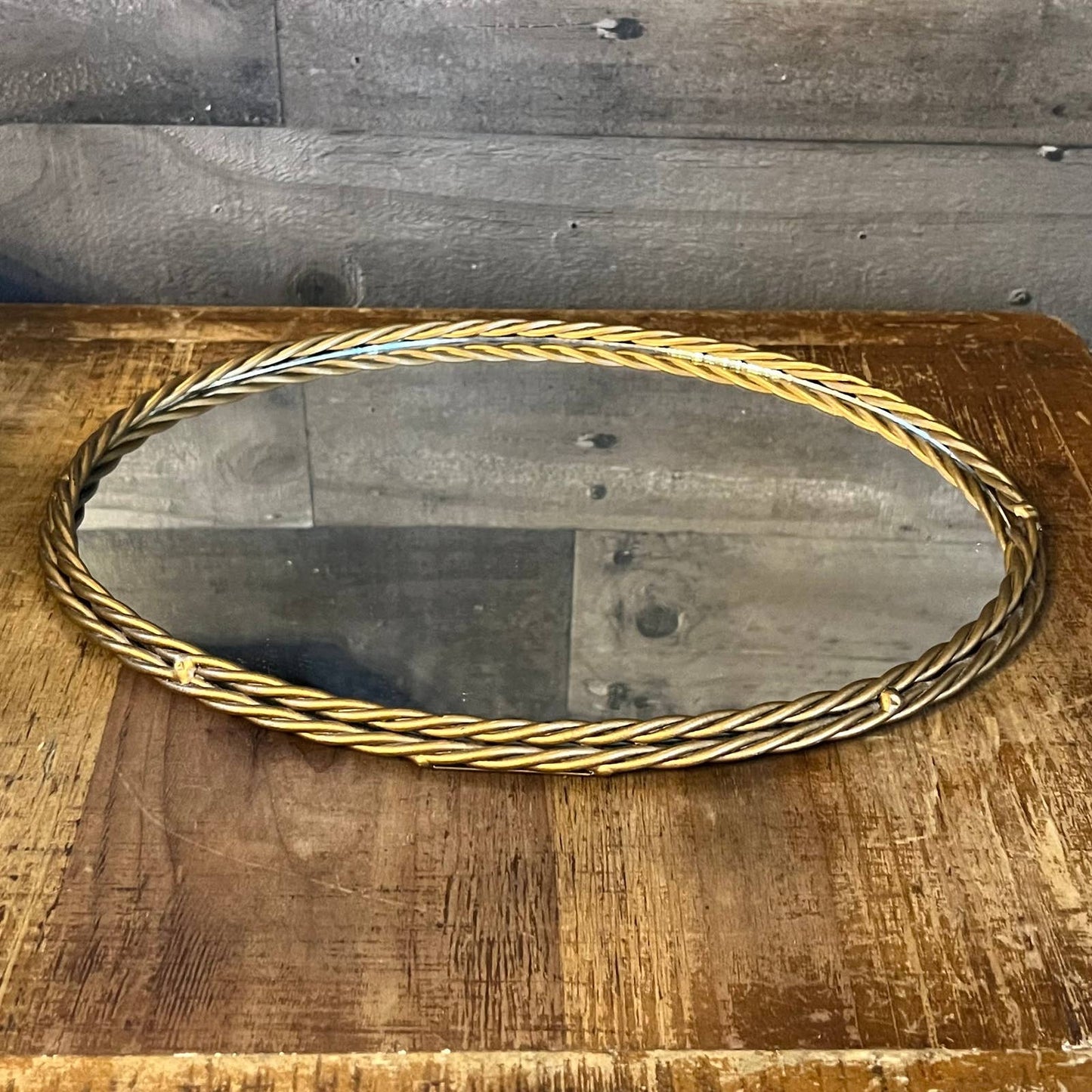 Vintage gold braided frame oval mirror