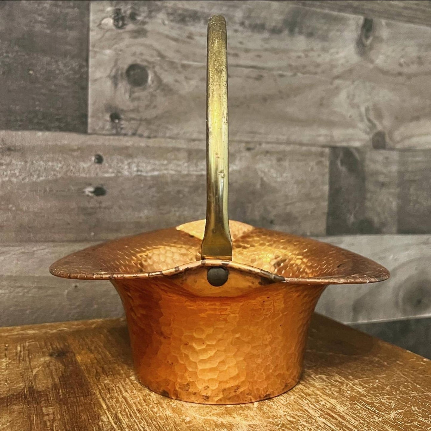 Vintage Coppercraft Guild hammered copper basket with brass handle
