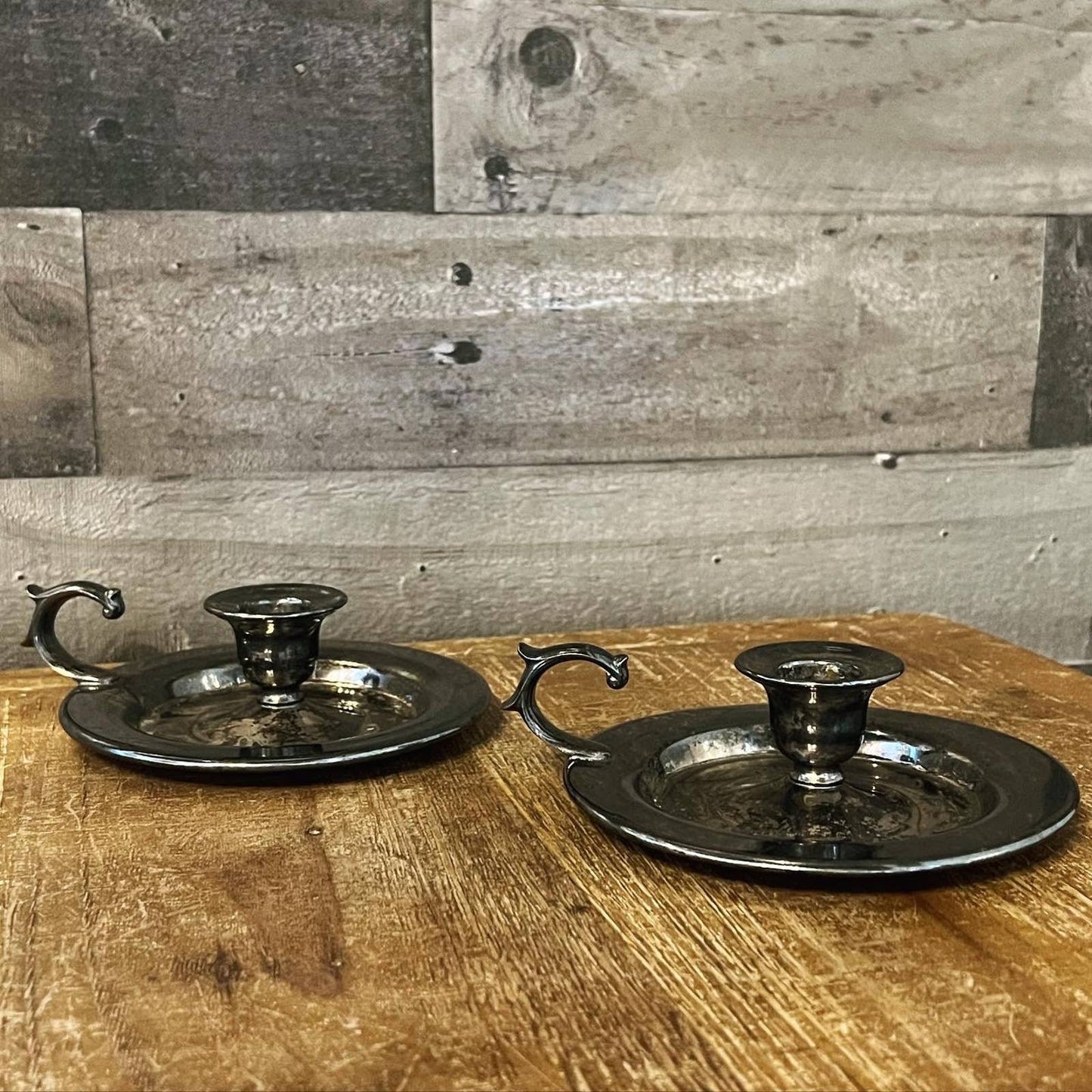 Vintage pair of aged silver tone candlestick holders - chamberstick