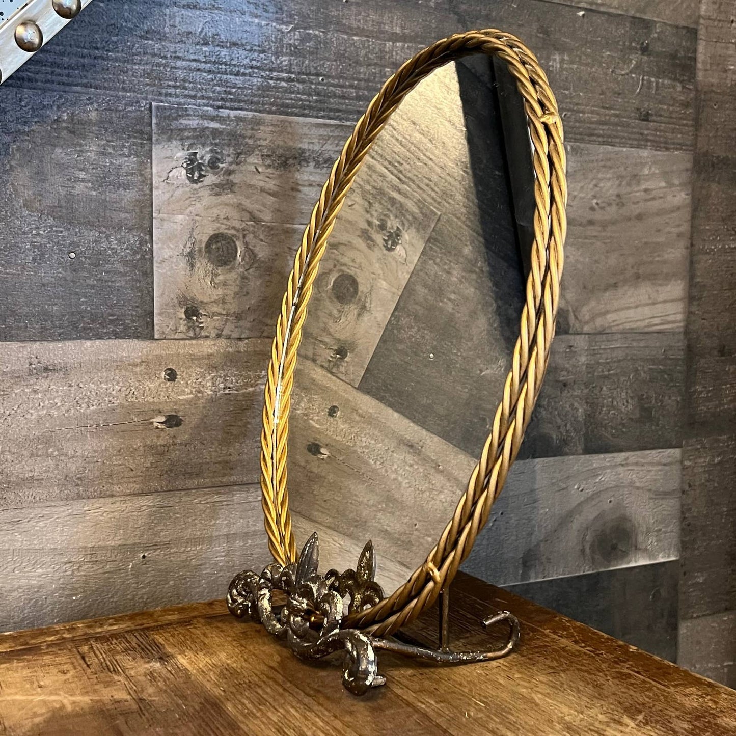 Vintage gold braided frame oval mirror