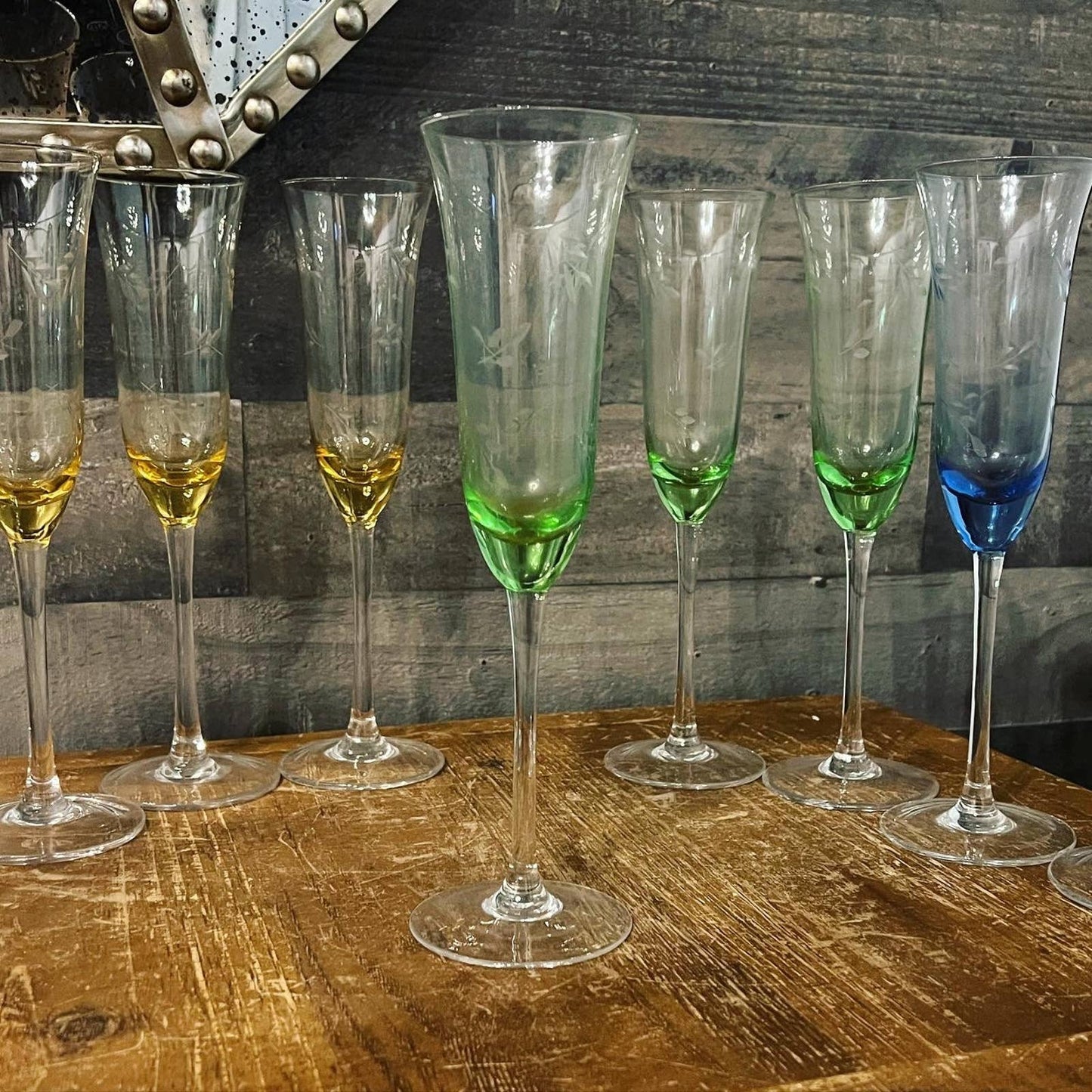 Multi color etched leaf crystal champagne flutes - pink, yellow, green, blue with champagne glasses