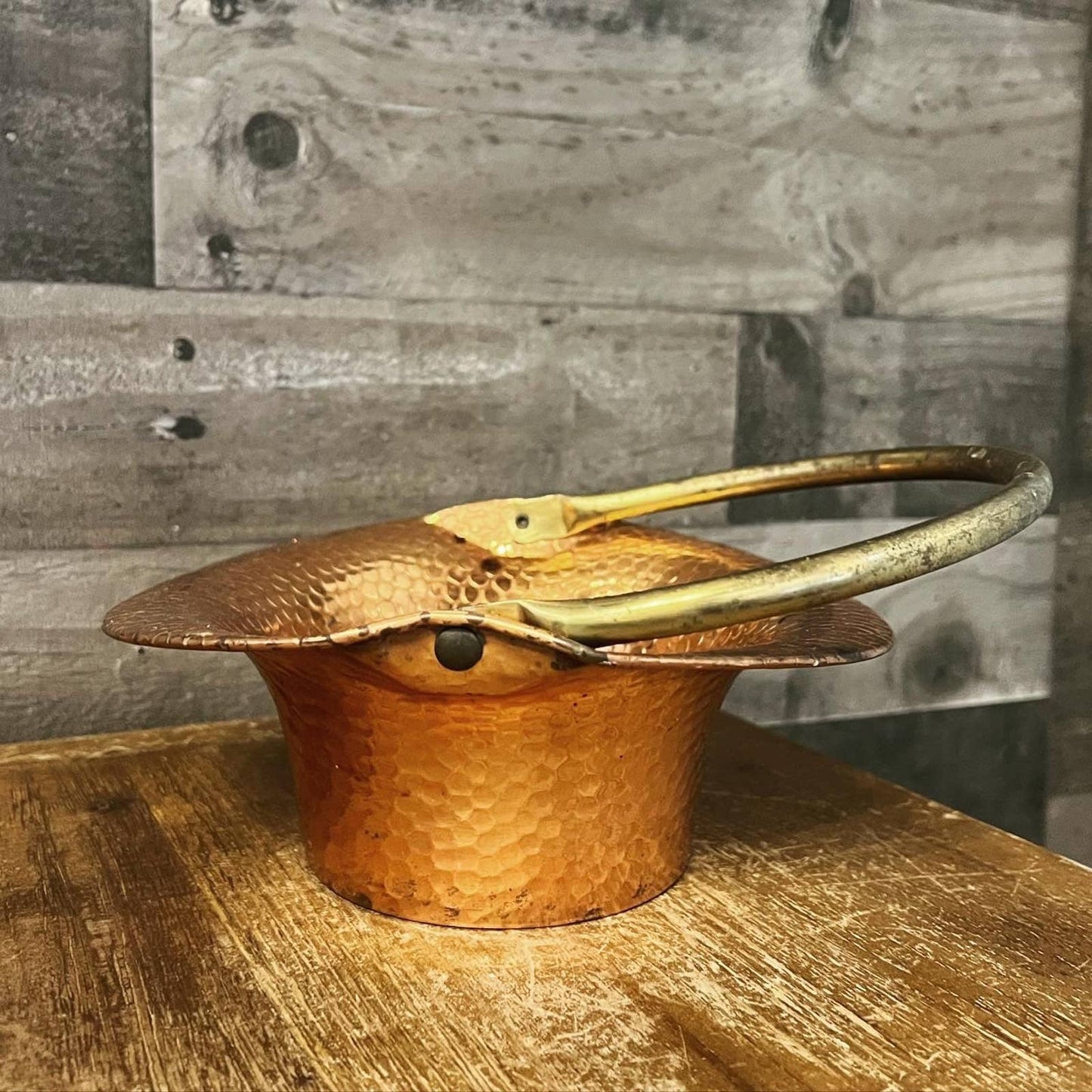 Vintage Coppercraft Guild hammered copper basket with brass handle