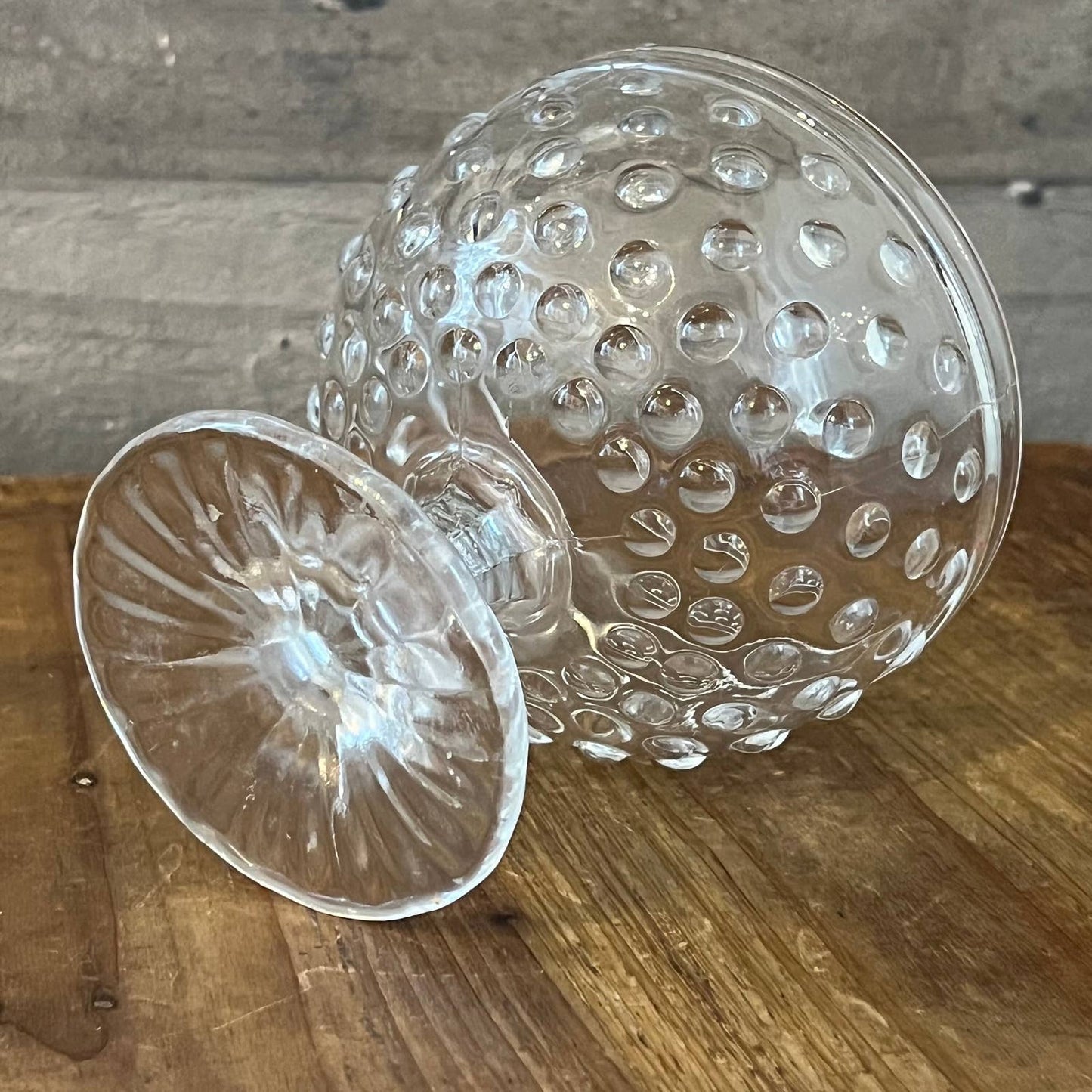 Clear glass hobnail footed candy dish