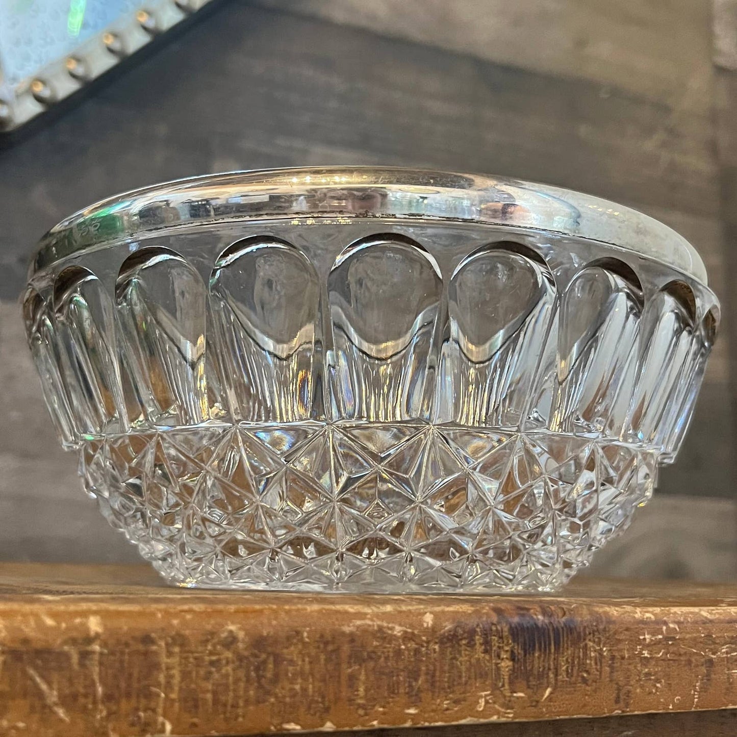 Vintage round crystal bowl with silver plated rim