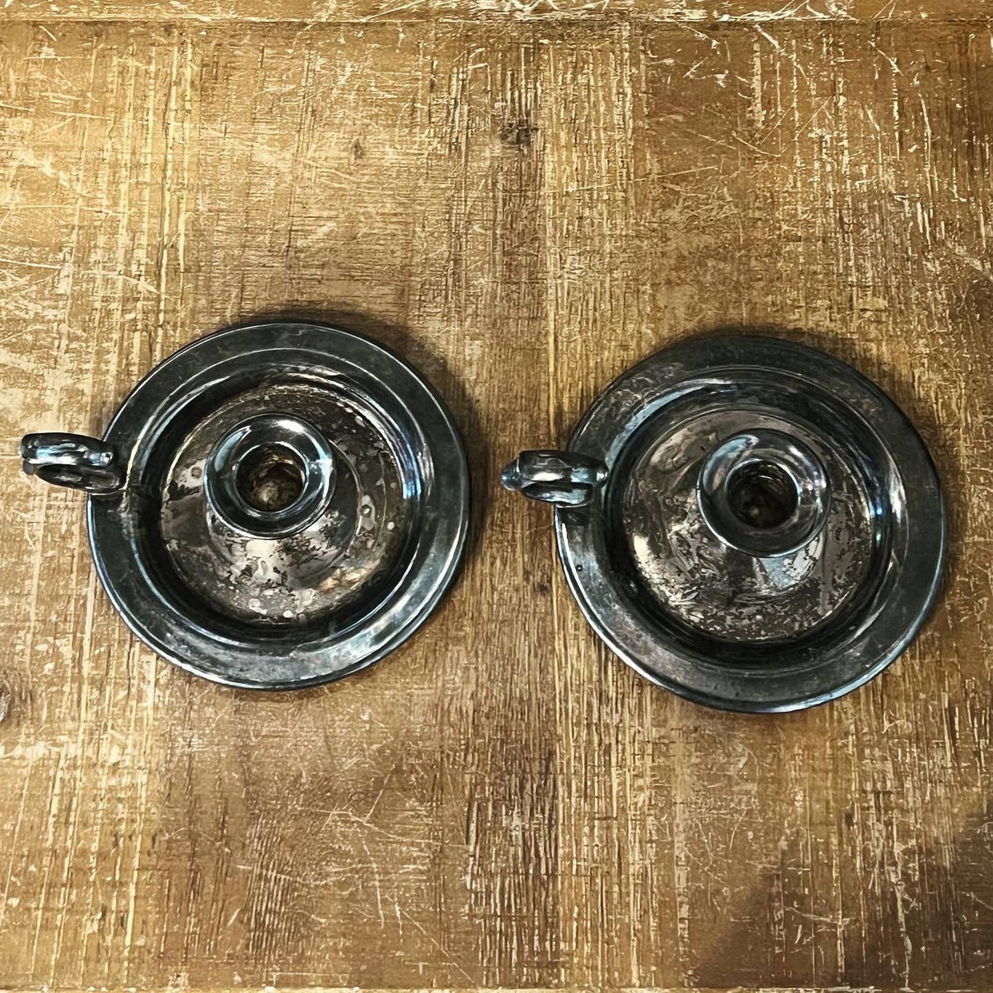 Vintage pair of aged silver tone candlestick holders - chamberstick