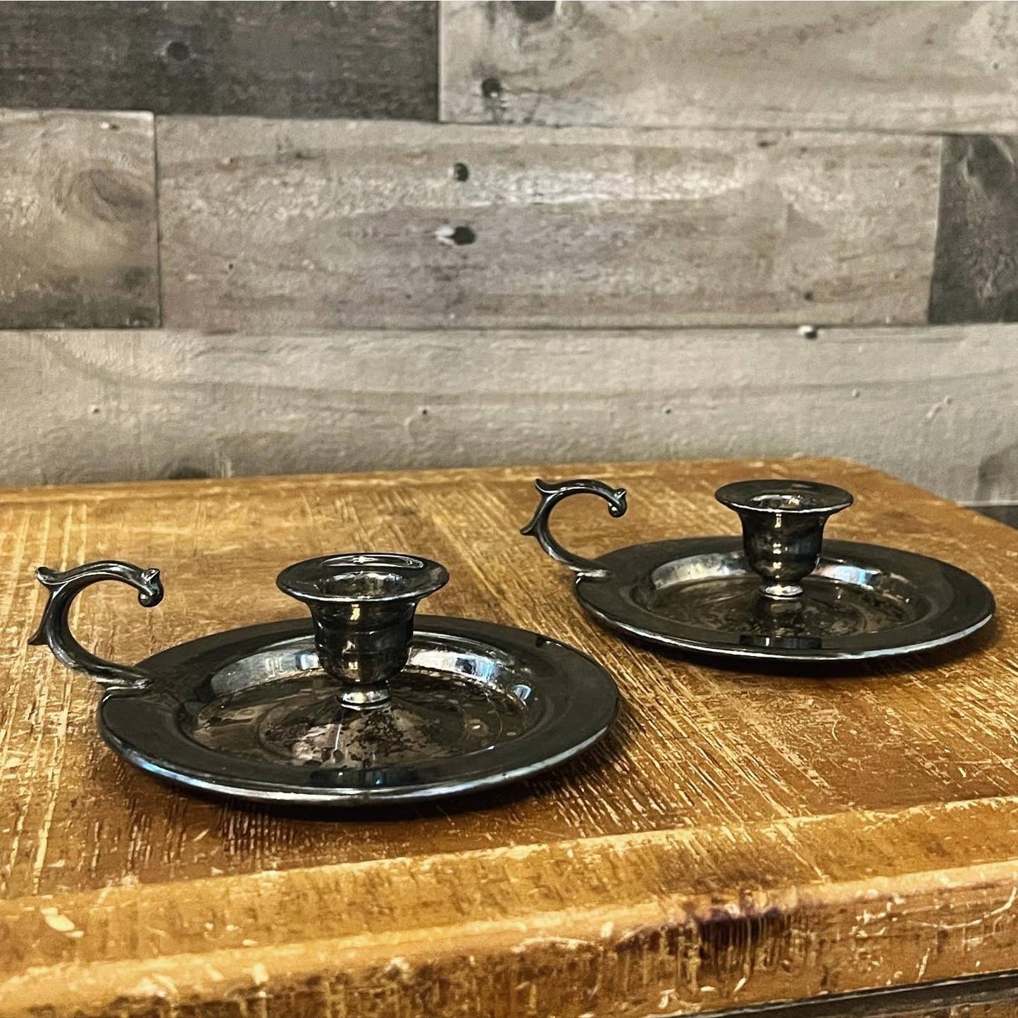 Vintage pair of aged silver tone candlestick holders - chamberstick