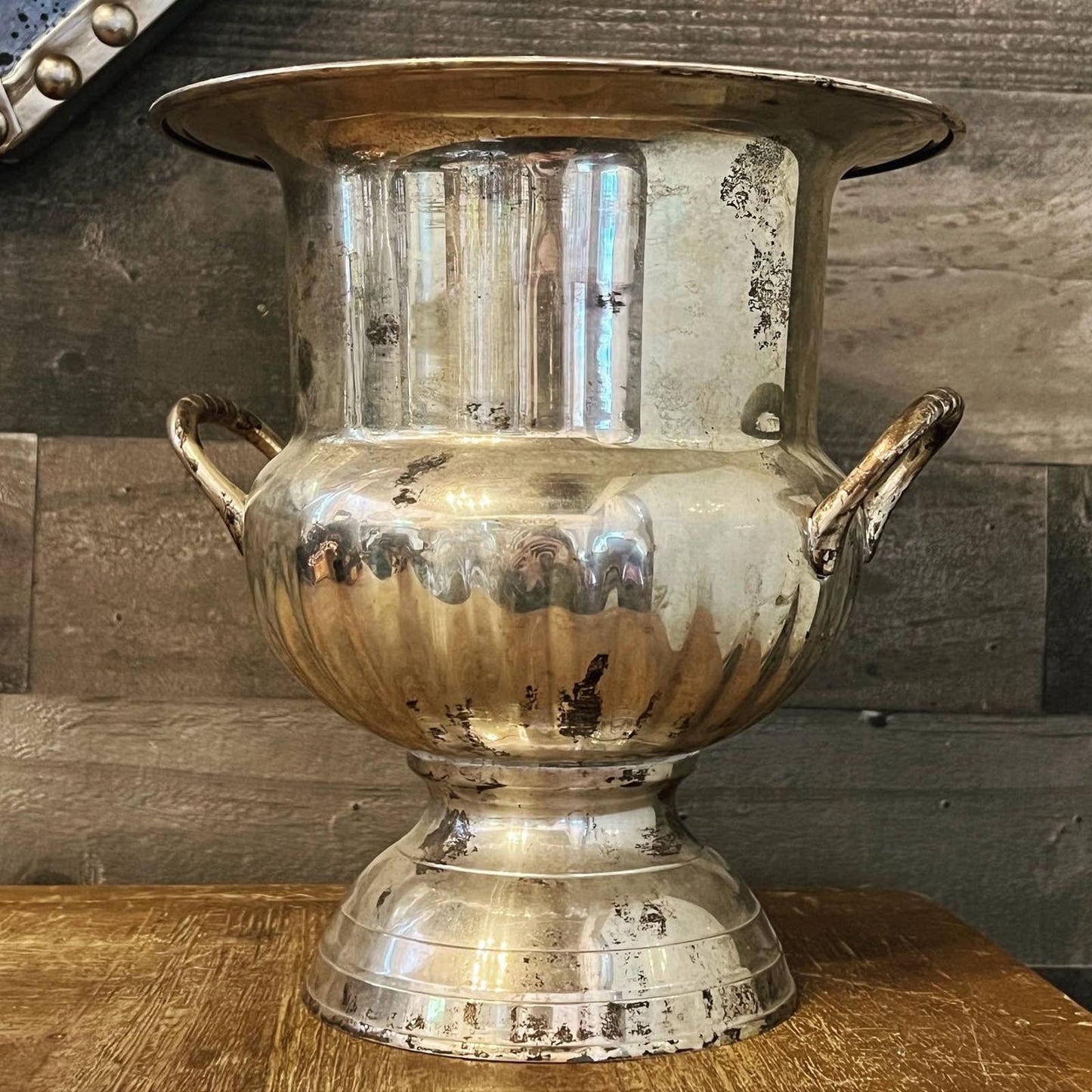 Vintage silver toned handled champagne / wine bottle chiller on a pedestal