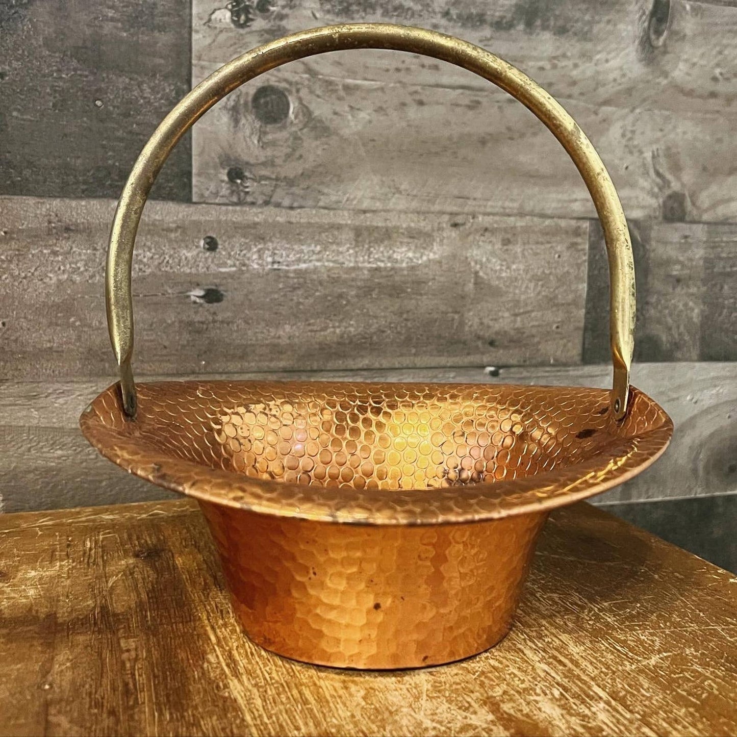 Vintage Coppercraft Guild hammered copper basket with brass handle