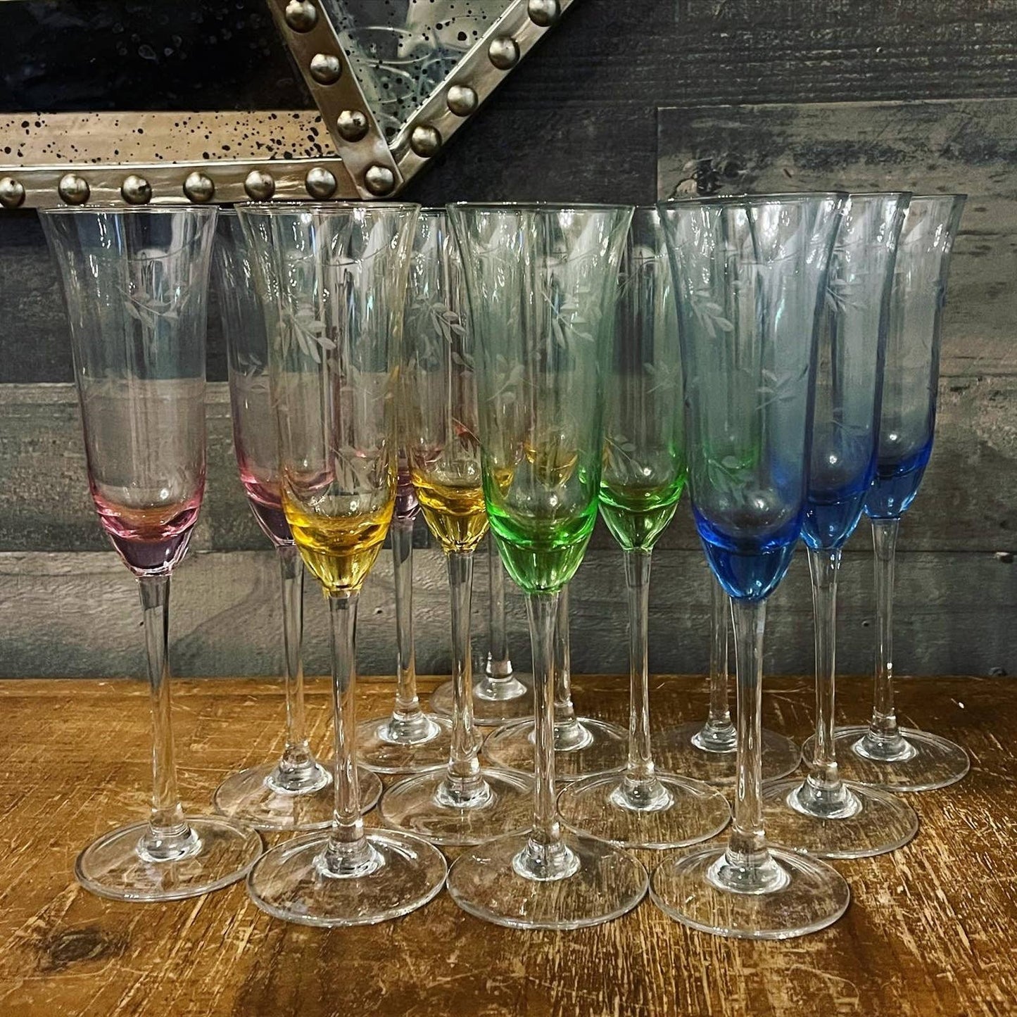 Multi color etched leaf crystal champagne flutes - pink, yellow, green, blue with champagne glasses