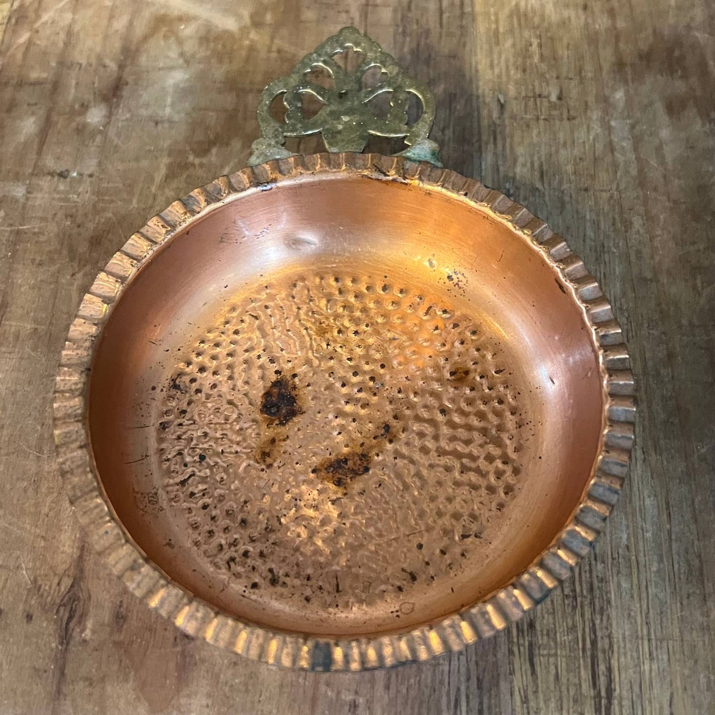 Vintage hammered copper trinket tray with brass handle