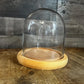 Clear Glass Dome Display on Round Wooden Base
