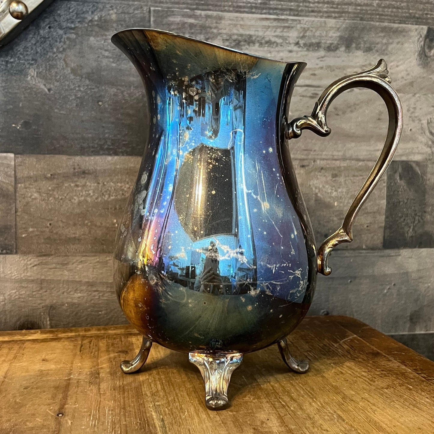 Vintage Oneida Silverplated Footed Pitcher with Ice Catch