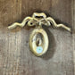 Antique French Solid Brass Medallion with Ribbon Design