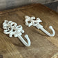2 Vintage Painted White Cast Iron Wall Hooks