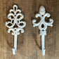 2 Vintage Painted White Cast Iron Wall Hooks
