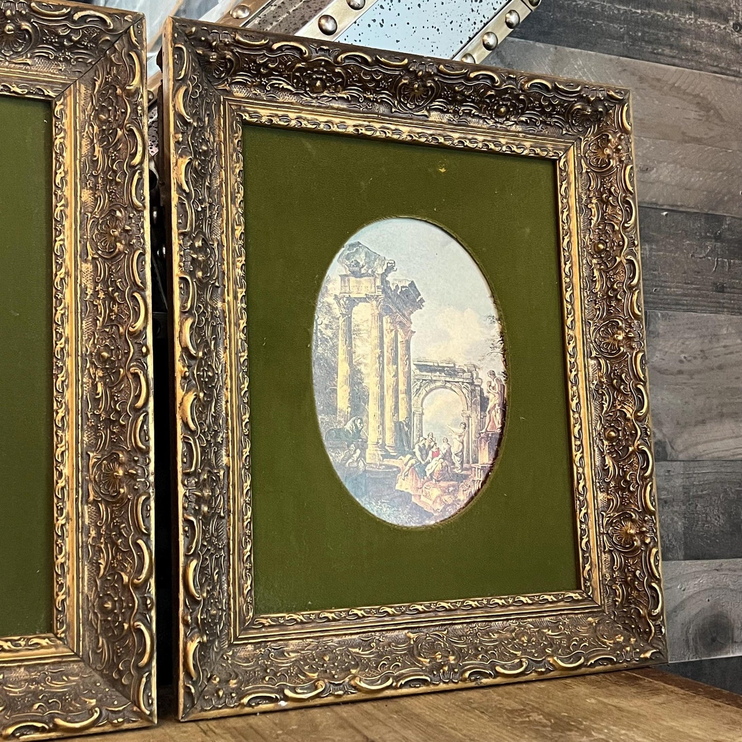 Pair of Oval Roman Ruins Scenes with Green Fabric and Vintage Wooden Frames