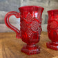 Pair of vintage Avon Ruby red pedestal mugs