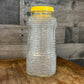 Anchor Hocking Soreno pattern clear glass refrigerator jar with yellow lid