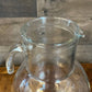 Vintage clear glass pitcher with white plastic lid