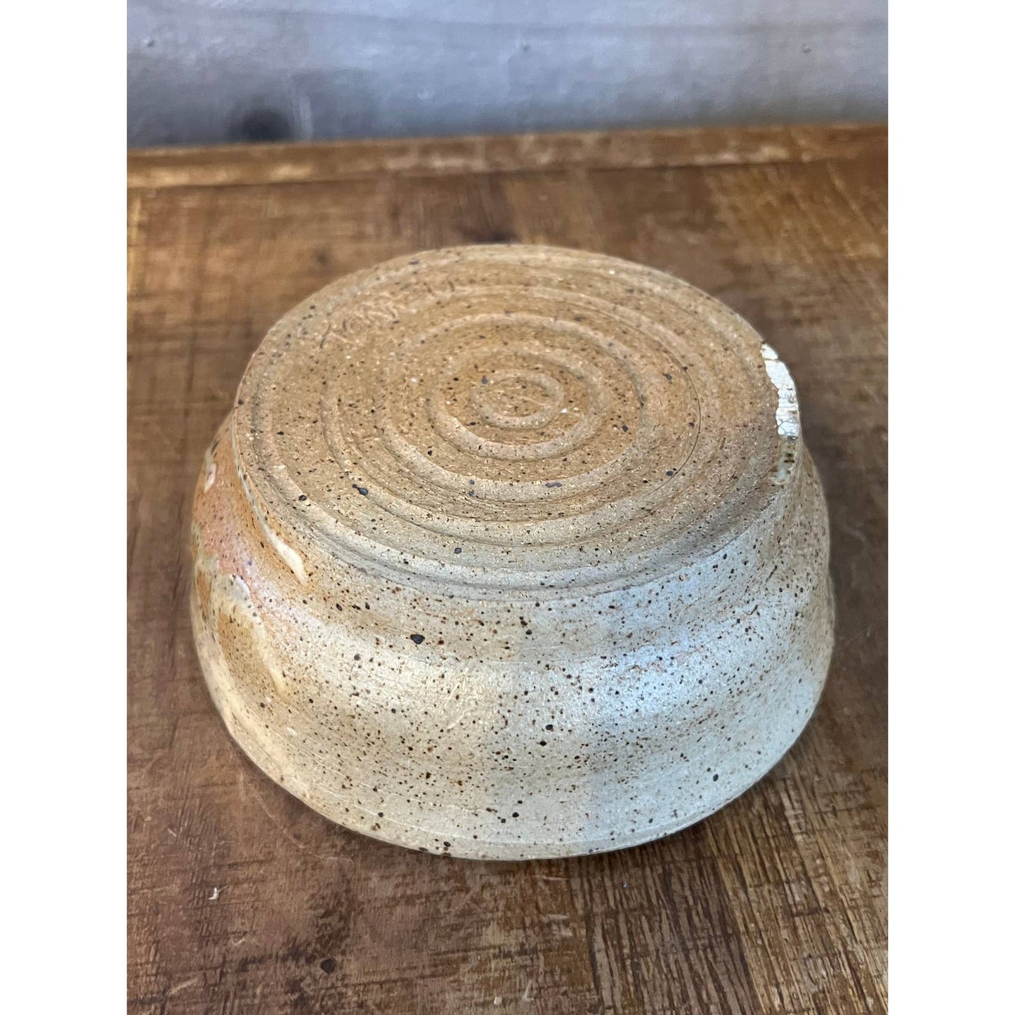 Neutral tone beige speckled glaze pottery bowl