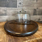 Vintage oval wooden charcuterie board with clear glass dome