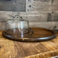 Vintage oval wooden charcuterie board with clear glass dome