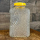 Anchor Hocking Soreno pattern clear glass refrigerator jar with yellow lid