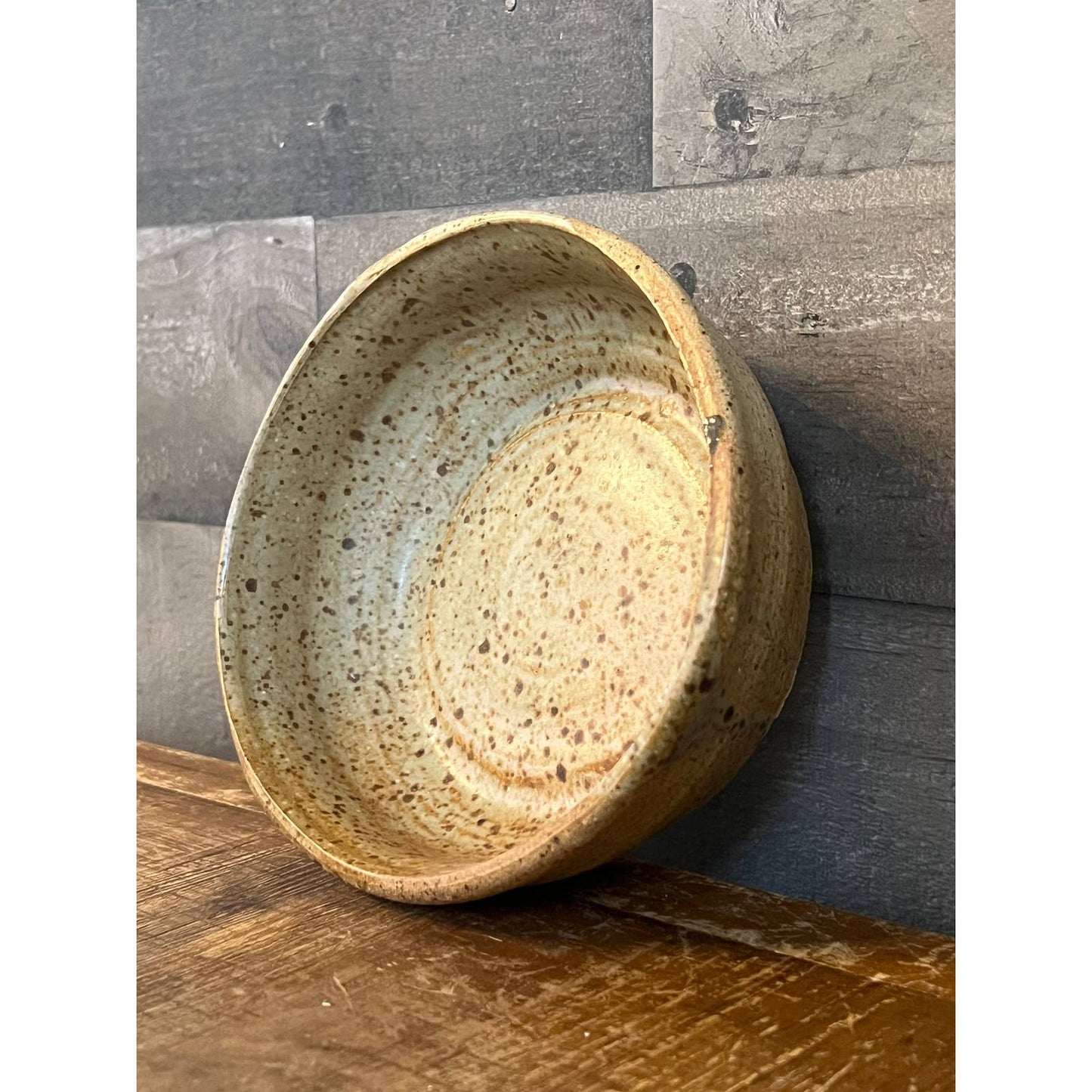 Neutral tone beige speckled glaze pottery bowl