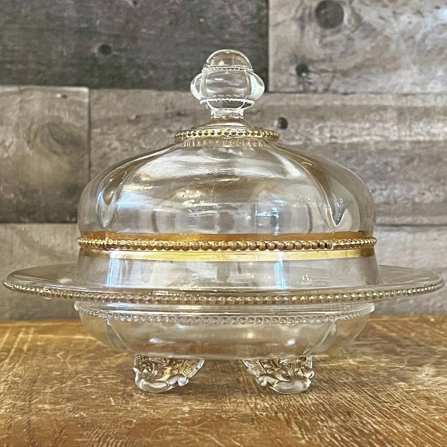 Vintage Victorian style footed clear glass and gold butter dome