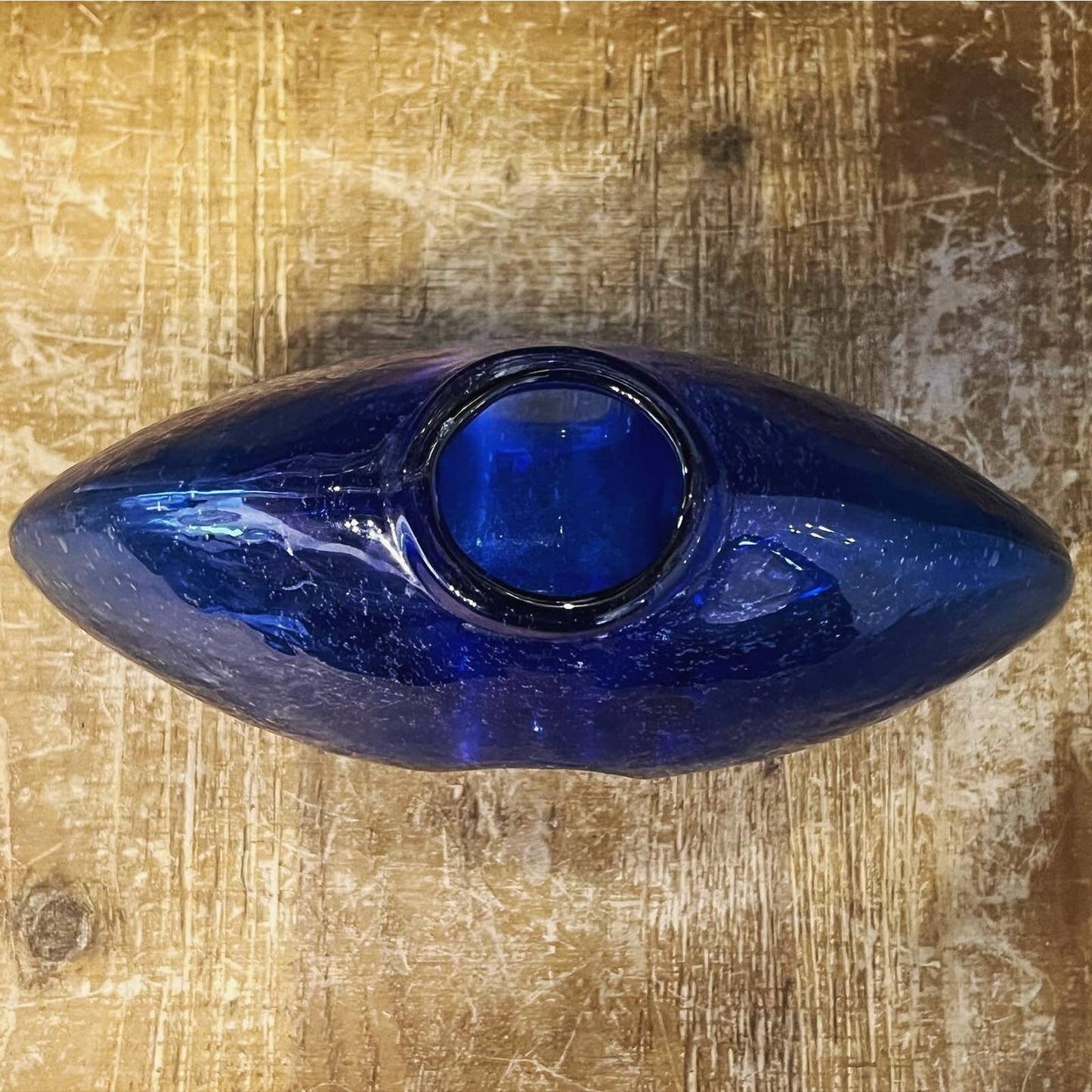 Cobalt blue glass blown donut hole oval vase