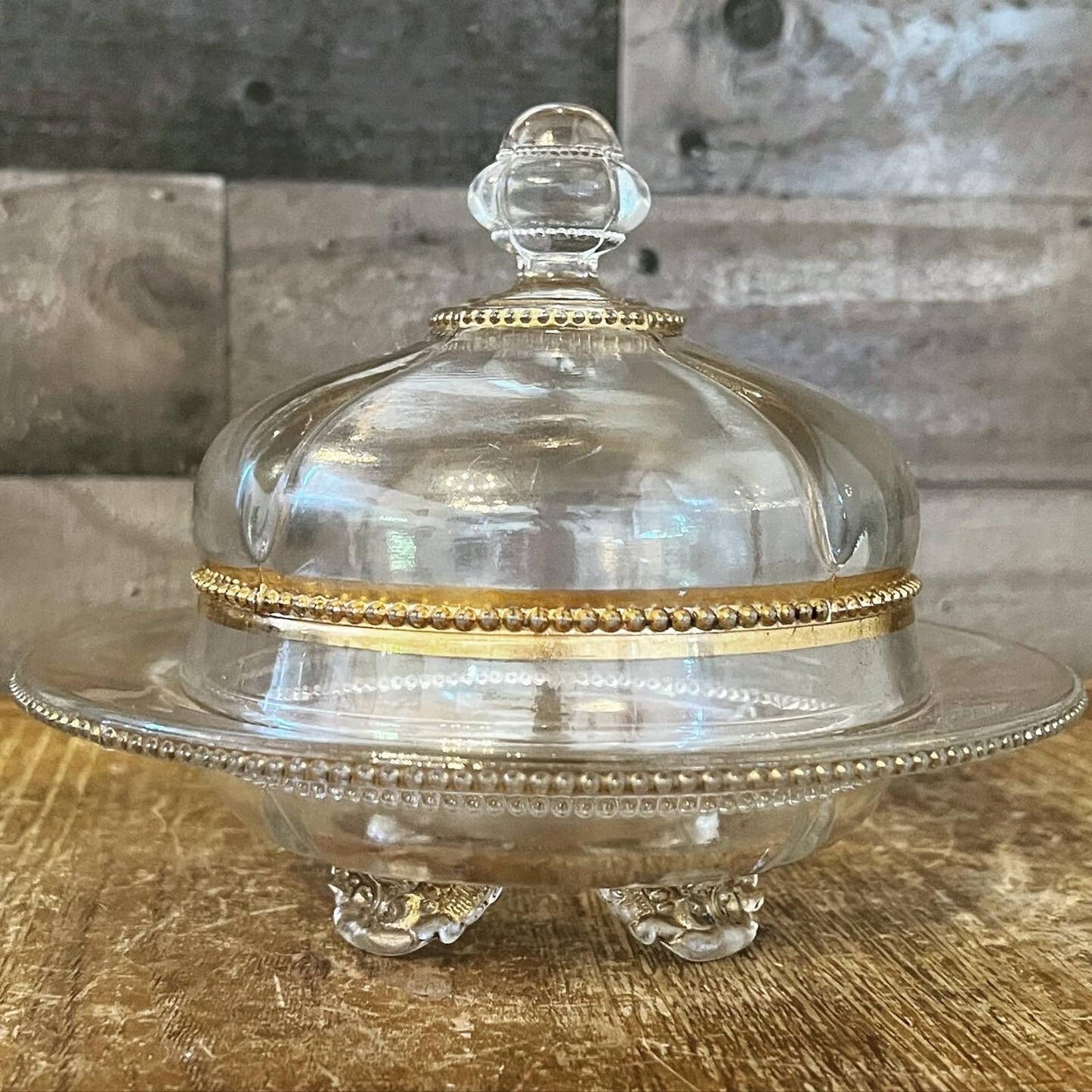 Vintage Victorian style footed clear glass and gold butter dome