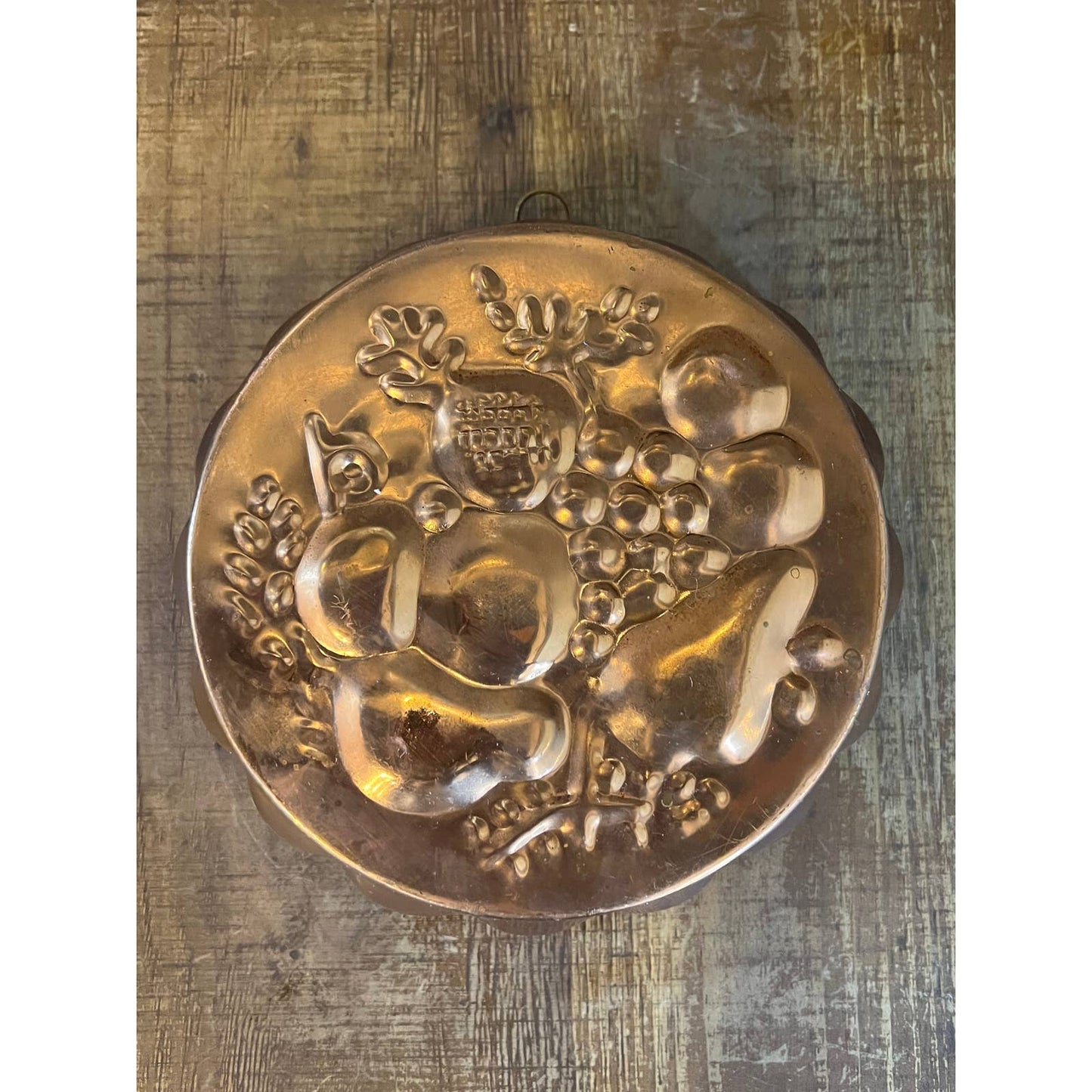 Vintage round copper and brass fruit mold