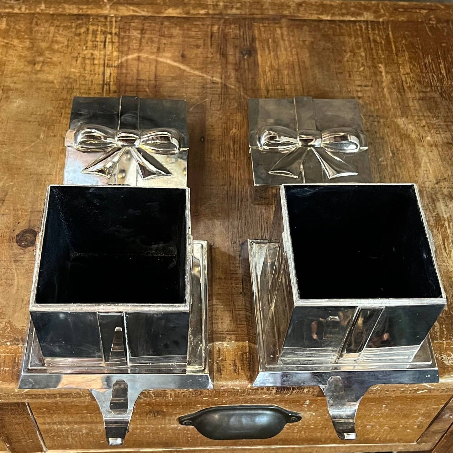 2 Pottery Barn silver wrapped gift stocking holders with hidden compartment