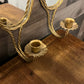 Vintage pair of gold braid mirrored candlestick wall sconces
