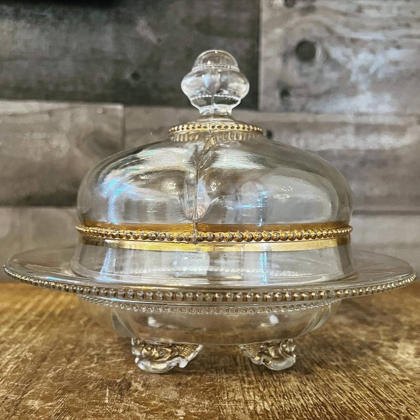 Vintage Victorian style footed clear glass and gold butter dome