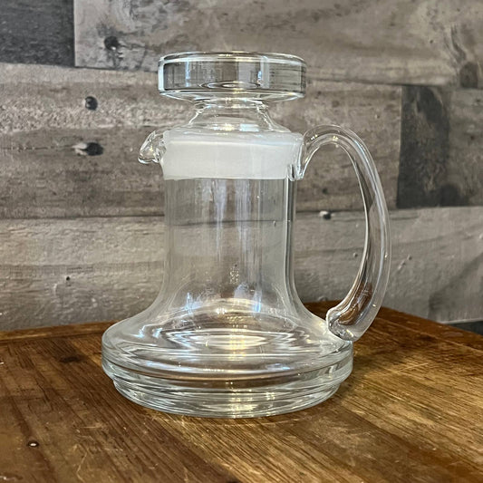 Small glass pitcher cruet with stopper